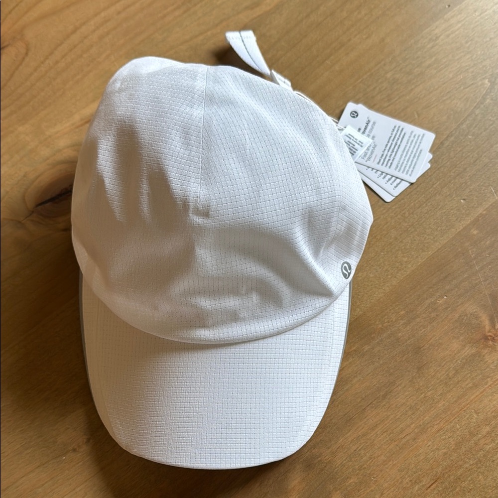 NWT fast and free running hat